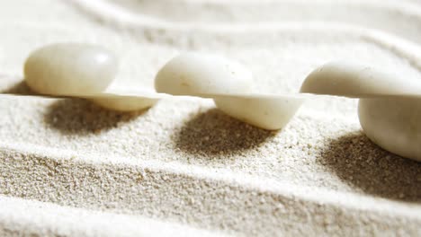 close-up of pebble stone on sand