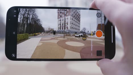 smartphone video recording of a playground and building