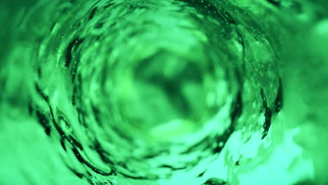 el agua se mueve en un vaso en cámara lenta. fondo de agua verde abstracto. bucle sin costuras 3d render