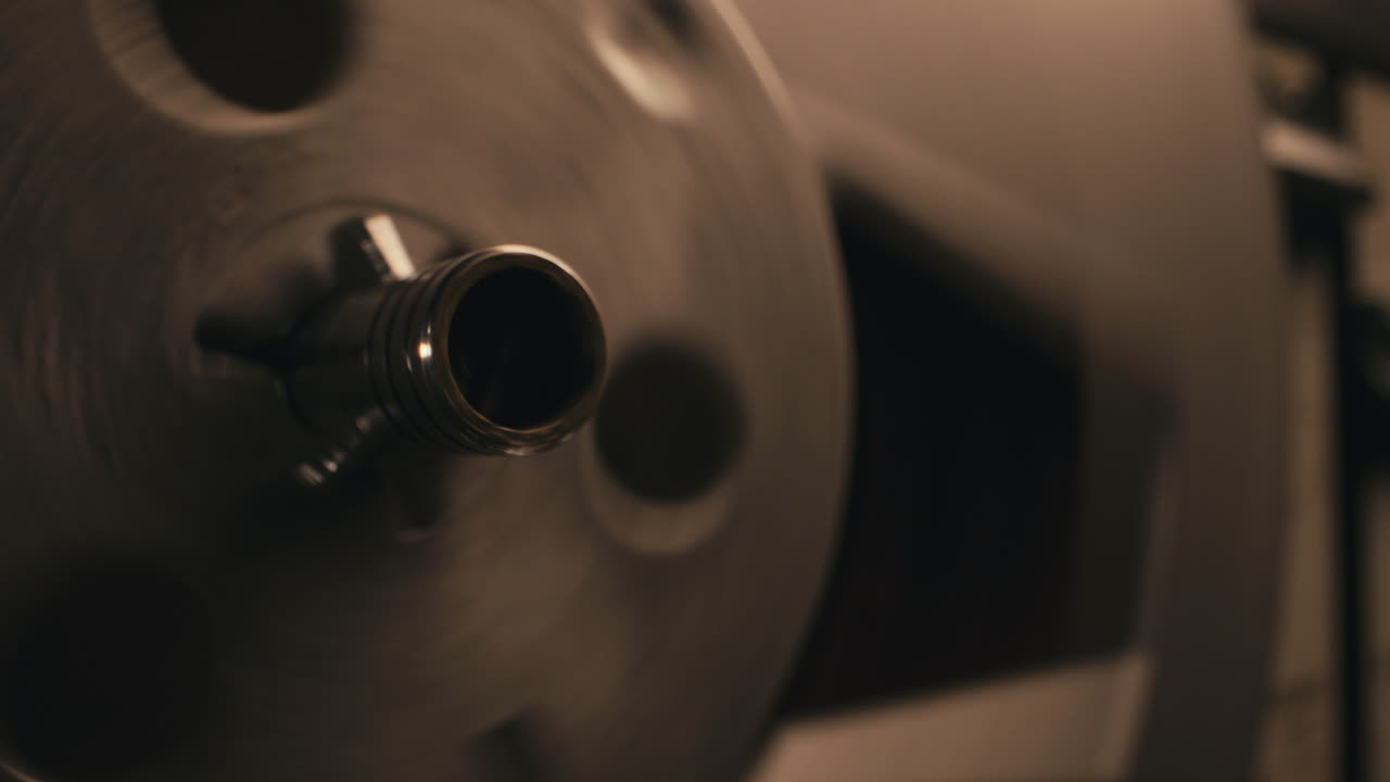 A vintage tape recorder in a pulsing light