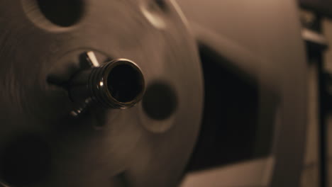a vintage tape recorder in a pulsing light