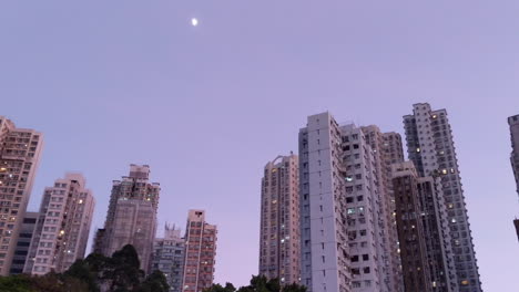 residential apartment buildings in kennedy town, hong kong in the evening
