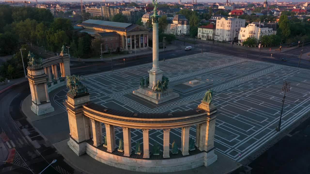 Drone footage of the empty Heroe's Square in Budapest, Hungary at the time of the Covid virus. Early morning at the sunrise in spring.
Drone circles slowly right.
