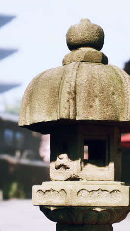 traditional stone lantern in a japanese garden