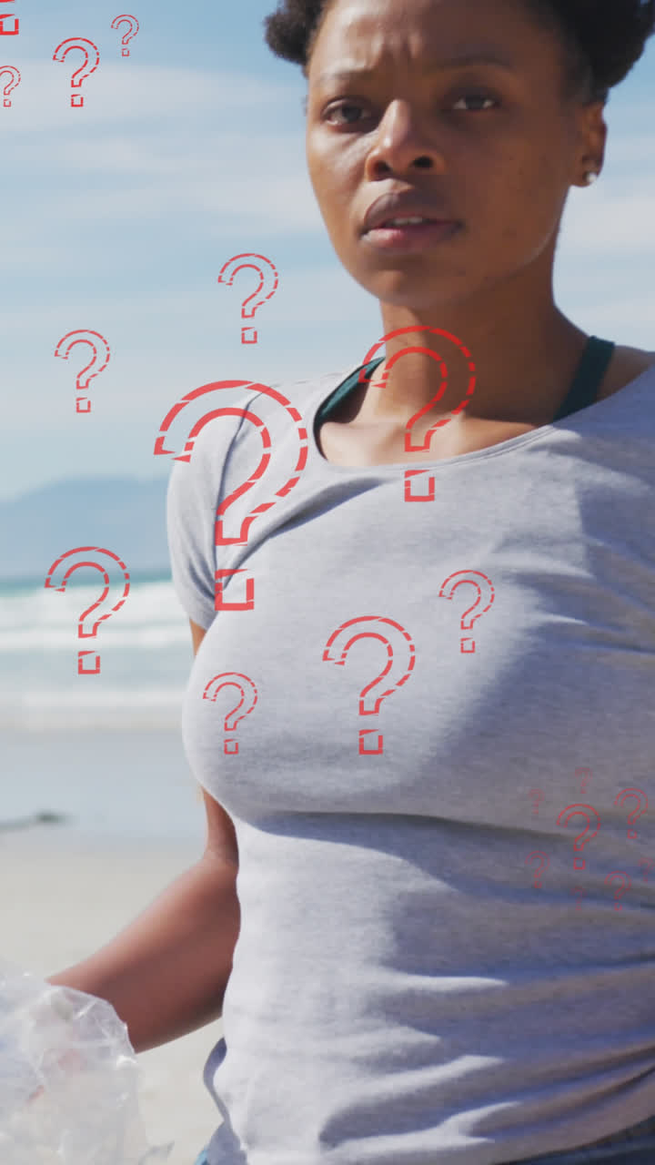 animación de signos de interrogación sobre una voluntaria biracial recogiendo basura en la playa