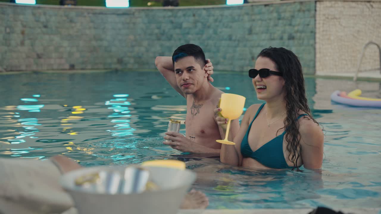 Friends Enjoying a Night Pool Party