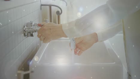 animation of macro coronavirus covid-19 cells spreading over man washing his hands in a sink