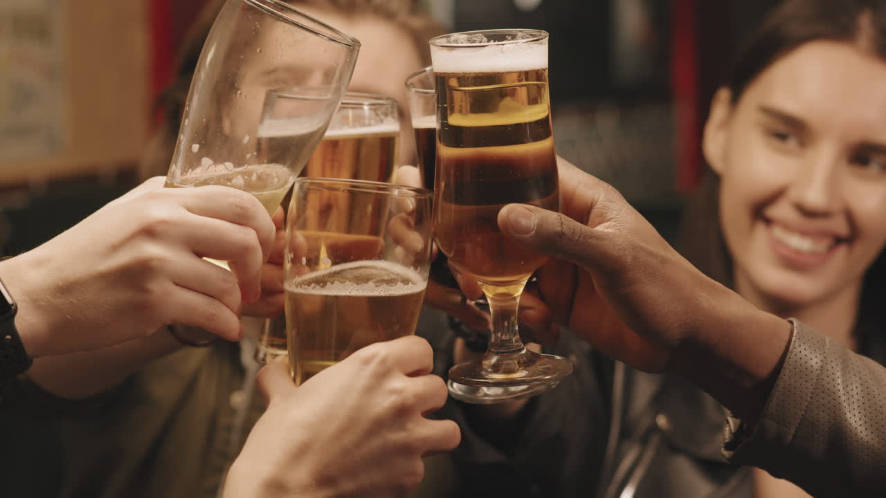 Friends Visiting Irish Pub In Evening