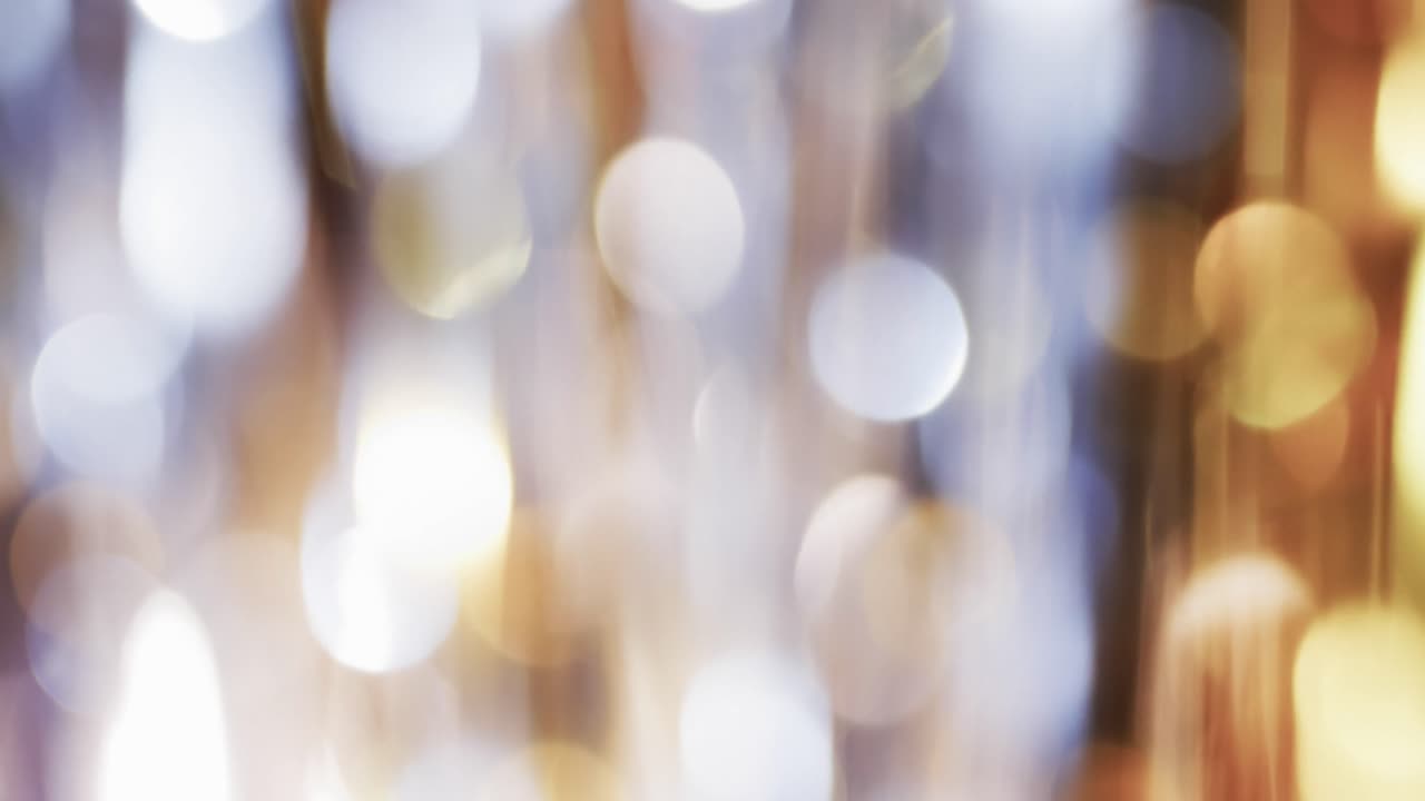 video de puntos de luz bokeh blancos parpadeantes con espacio de copia
