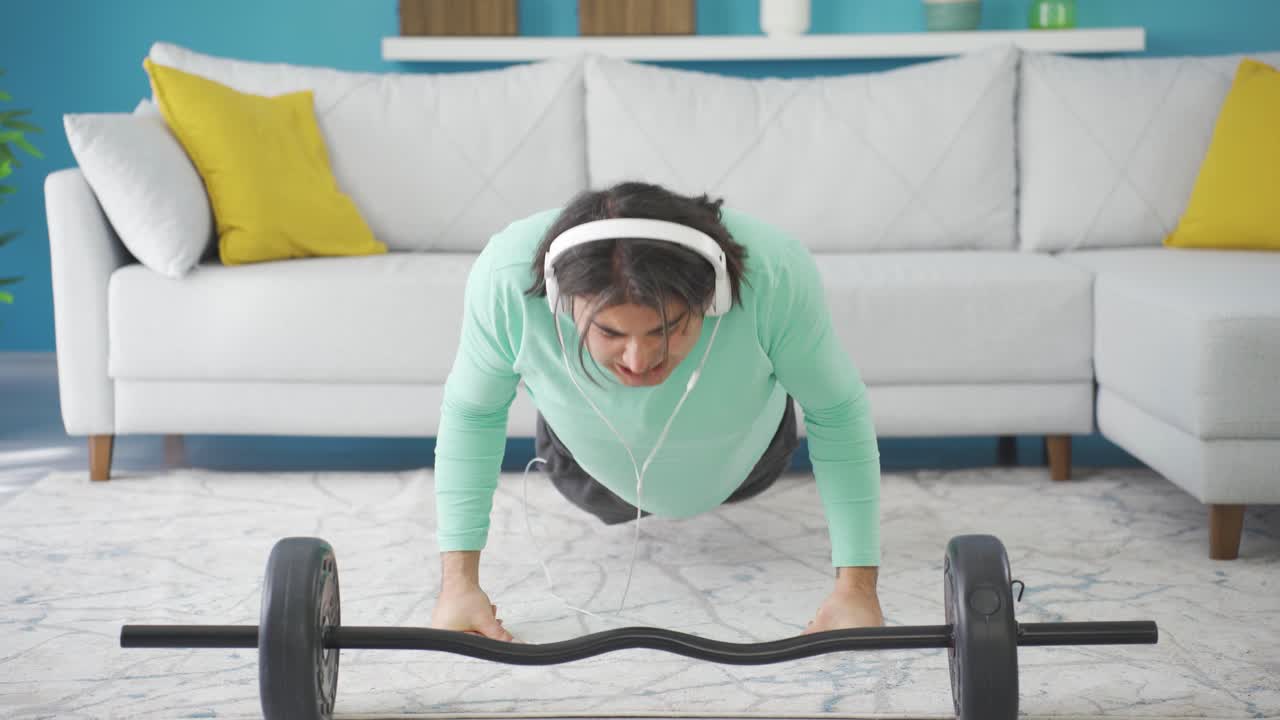 Funny belly guy who can't do pushups. Fun sports video.