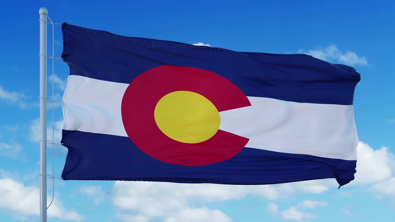 Colorado waving in the wind, blue sky background. 4K
