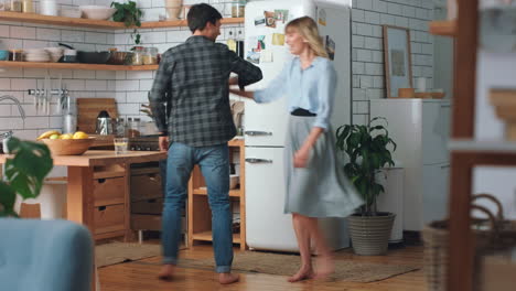 Love,-freedom-and-couple-dance-in-a-kitchen
