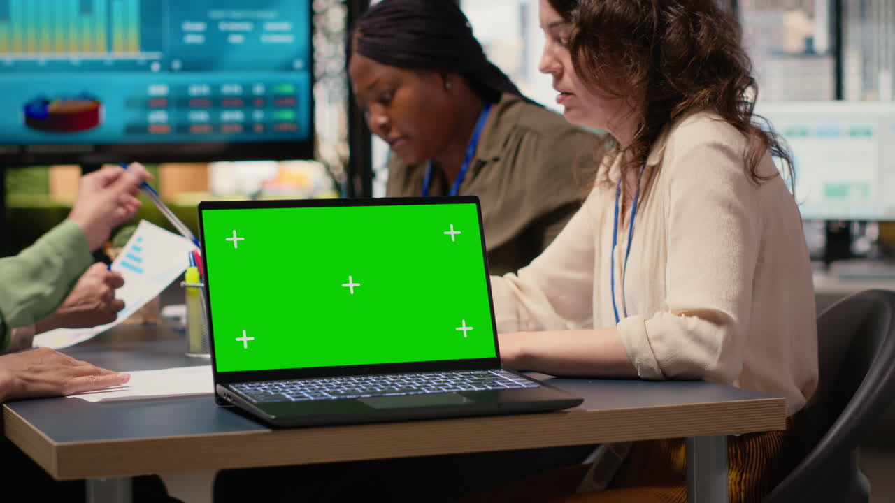 Ambitious professionals align goals for collaboration with mockup screen