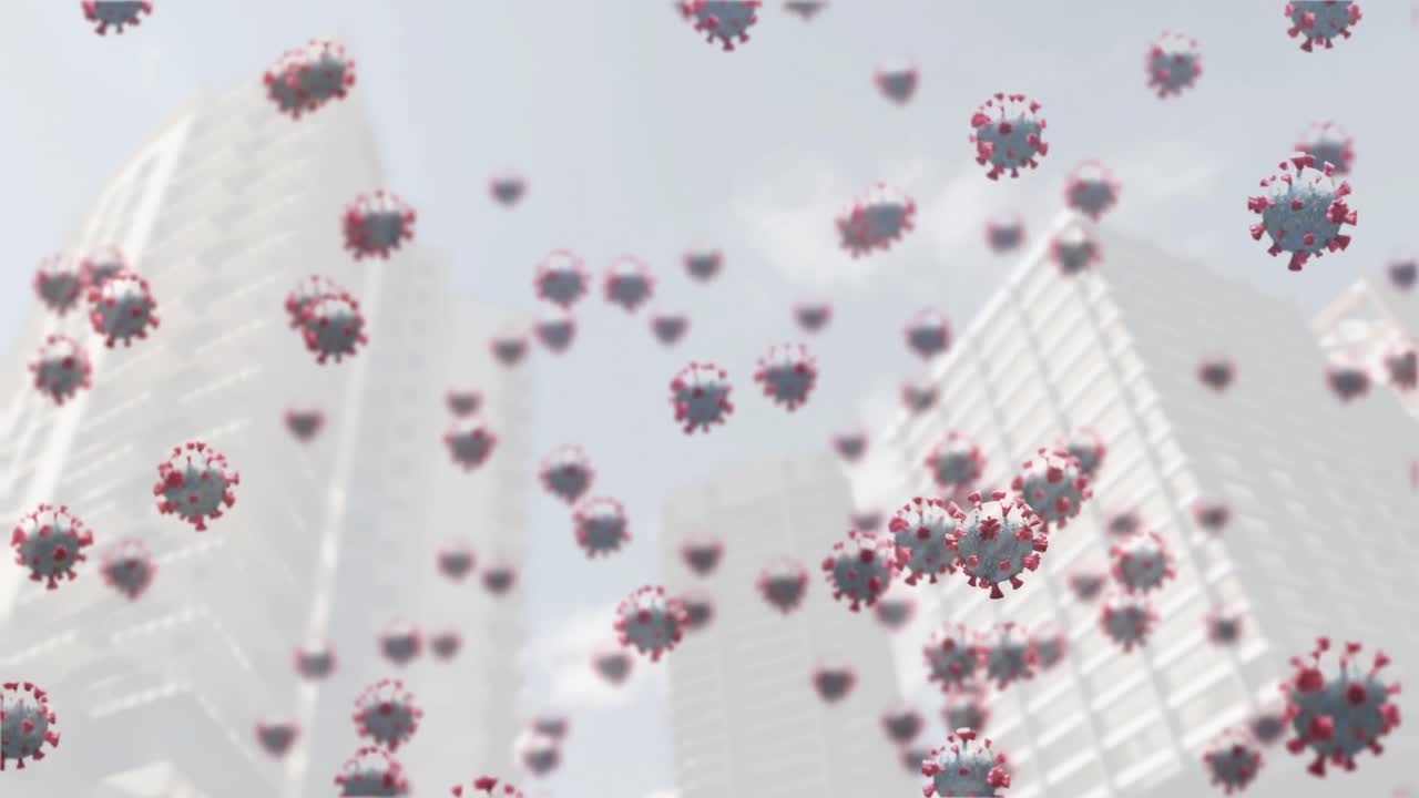 Animation of coronavirus cells floating over cityscape