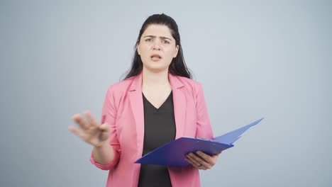 Business-woman-alerting-camera-with-stern-expression.