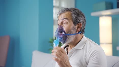 man with shortness of breath wears respirator.