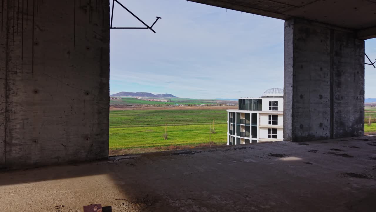 Construction site view of unfinished building from above