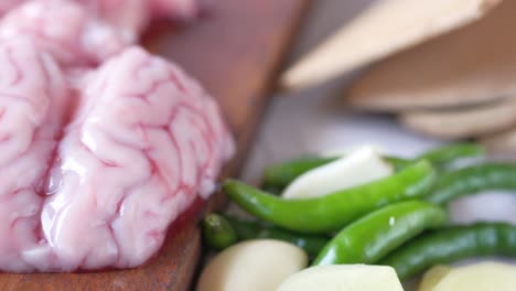 raw brain with vegetables