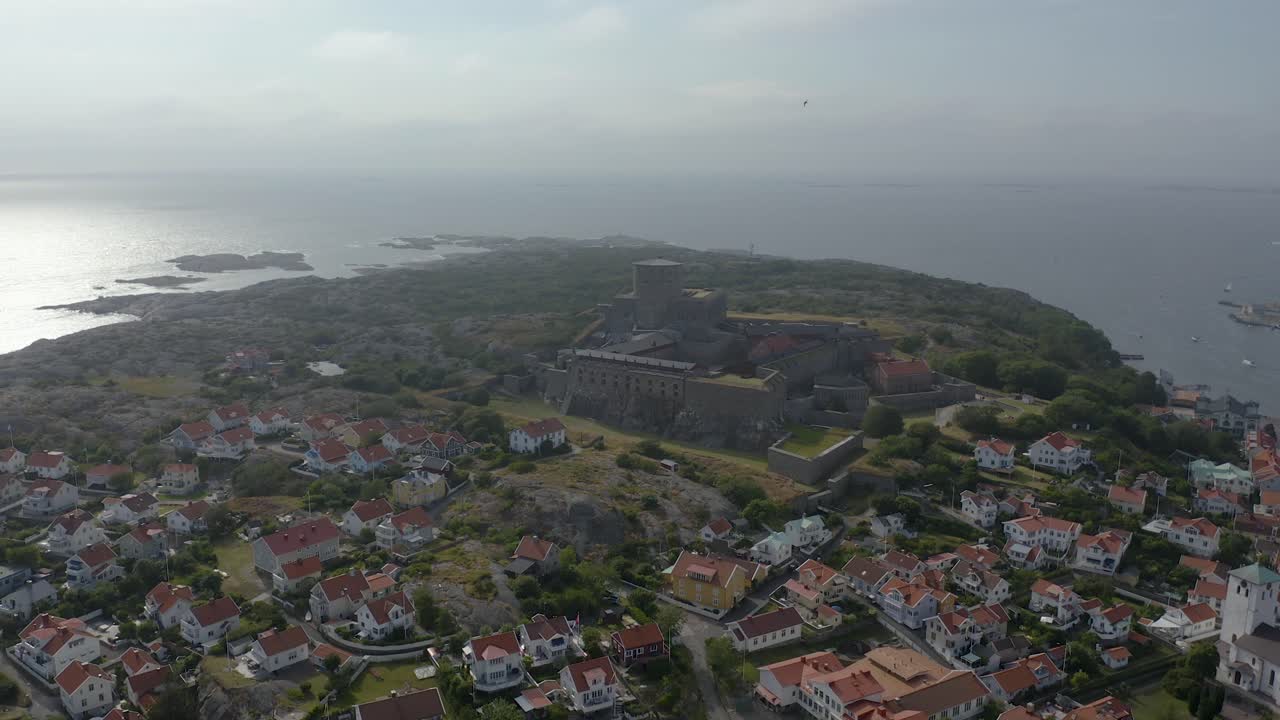 Drone flight over a fortress during sunset