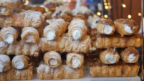 close-up of delicious cream puffs at a market