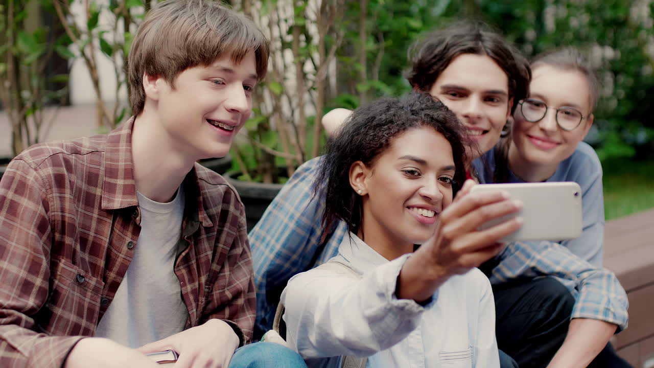 Multiethnic friends in university campus.