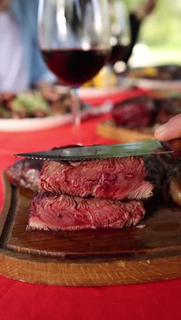 delicious sliced steak on a wooden board