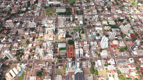 top-down aerial view of the toledo dense city skyline with high-rise buildings and streets, paraná, brazil.