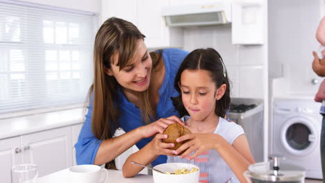 Happy-family-having-breakfast-