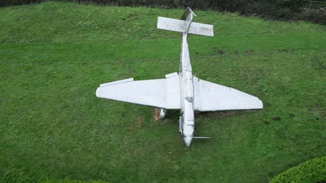 Stainless-steel-Junkers-ju87-Stuka-scuplture-in-Capel-Le-Ferne-Battle-of-Britain-memorial-garden,-Aerial-view