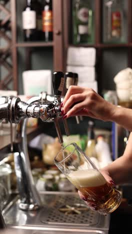 bartender pouring beer