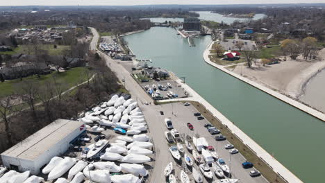 boats storage area, outside nautical parking dock for sailing yachts and leisure boats at port dalhousie pier ontario canada, harbor marina quay and coastal waterfront landscape, aerial view