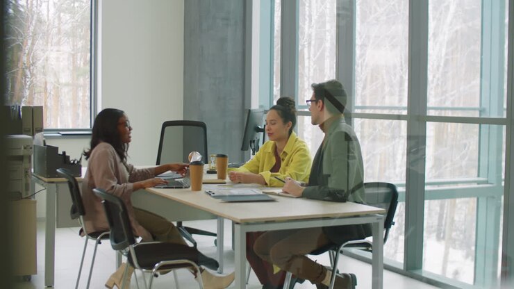Multiethnic Business Team Having Meeting in Modern Office