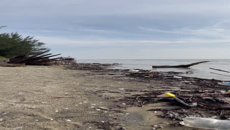 beautiful summer view at kabong beach homestay,with white sandy beach during king tide,sarawak,malaysia