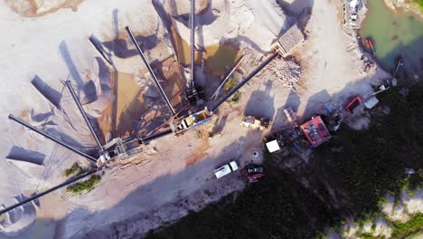 Aerial-straight-down-shot-from-a-drone-of-quarry-and-heavy-machinery-in-pomeranian-district-in-Poland