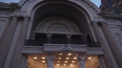 Looking-Up-On-Arched-Entrance-Of-Municipal-Theatre-Of-Ho-Chi-Minh-City-At-Dusk-In-Vietnam