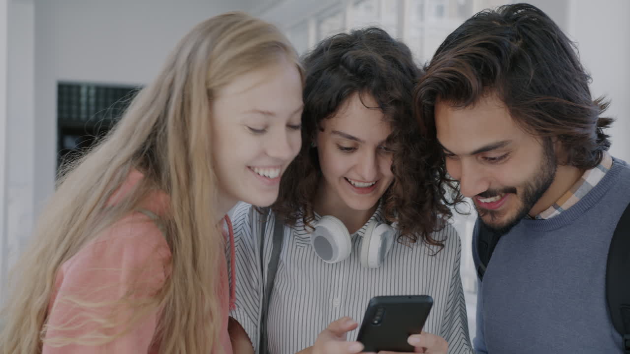 Group of Students Looking at a Smartphone
