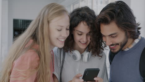 group of students looking at a smartphone