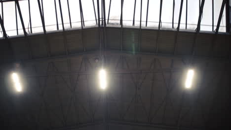 industrial building interior with skylights and lights