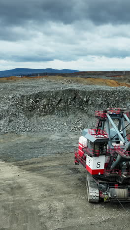 giant mining excavator in an open-pit mine