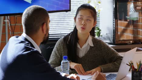 Business-executive-interacting-with-each-other-in-conference-room-4k