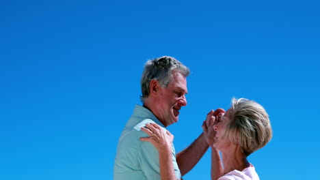 Active-seniors-dancing-together-and-smiling