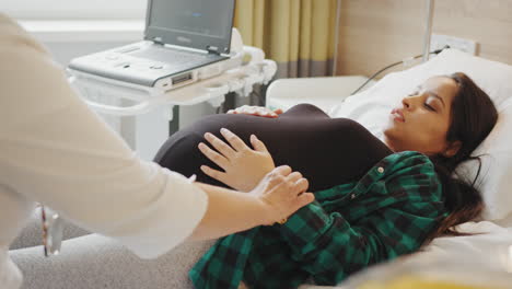 pregnant woman undergoing ultrasound examination