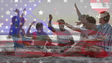 animation of american flag and texture over happy diverse friends dancing, sitting on sunny beach