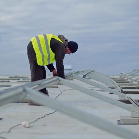 man installing alternative energy