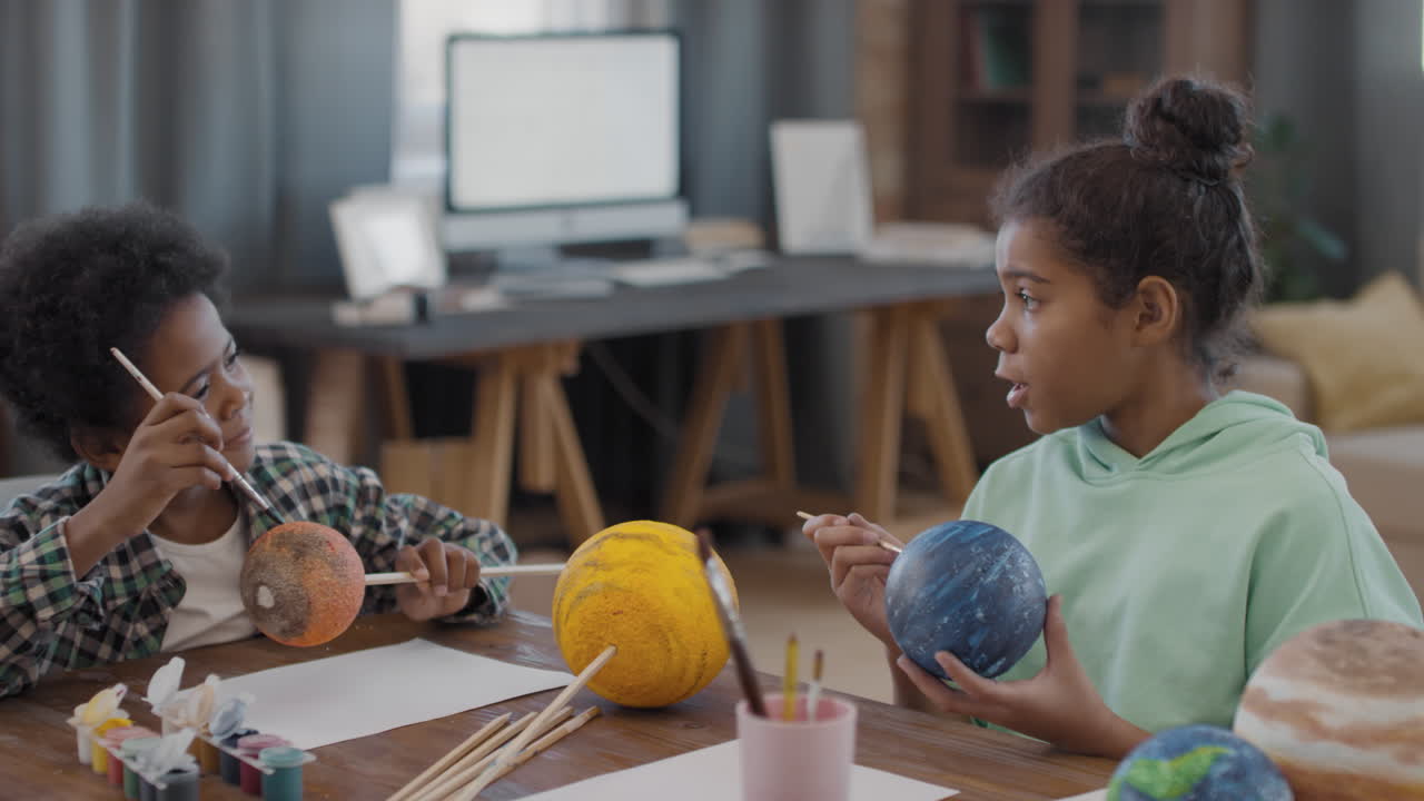 Afro Kids Crafting And Painting Globe Models