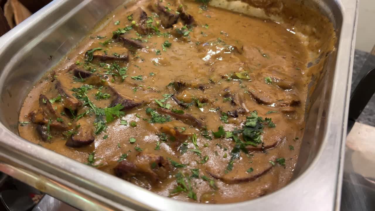 Mutton roast prepared with rum in Bengali style in Kolkata