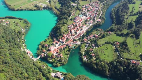 Cinematic-shot-,-Aerial-view-of-Most-Na-Soci-lake-with-beautiful-turquoise-colors-near-Tolmin-in-Slovenia