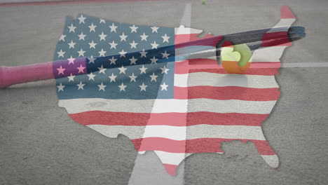 pink grip racket lying on gray court near yellow ball and us silhouette displaying flag pattern