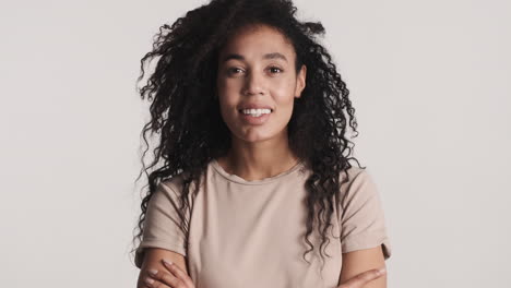 african american confident woman over white background.