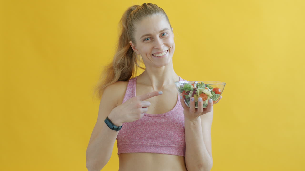 Woman Holding a Bowl of Salad